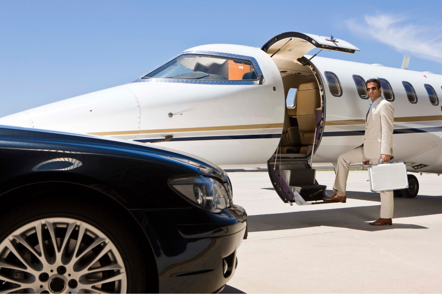 Traveler stepping off a private jet